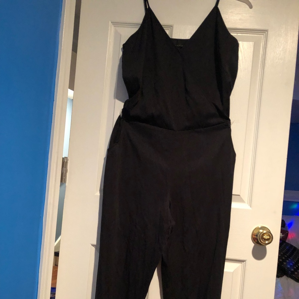 Black sleeveless jumpsuit